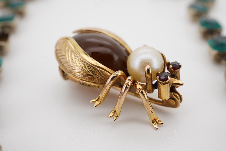 A 14k, cultured pearl, garnet and cabochon stone set bug brooch, 24mm, gross weight 3.4 grams, together with an antique gilt metal and paste set necklace (stones missing), 35cm. Condition - poor and good